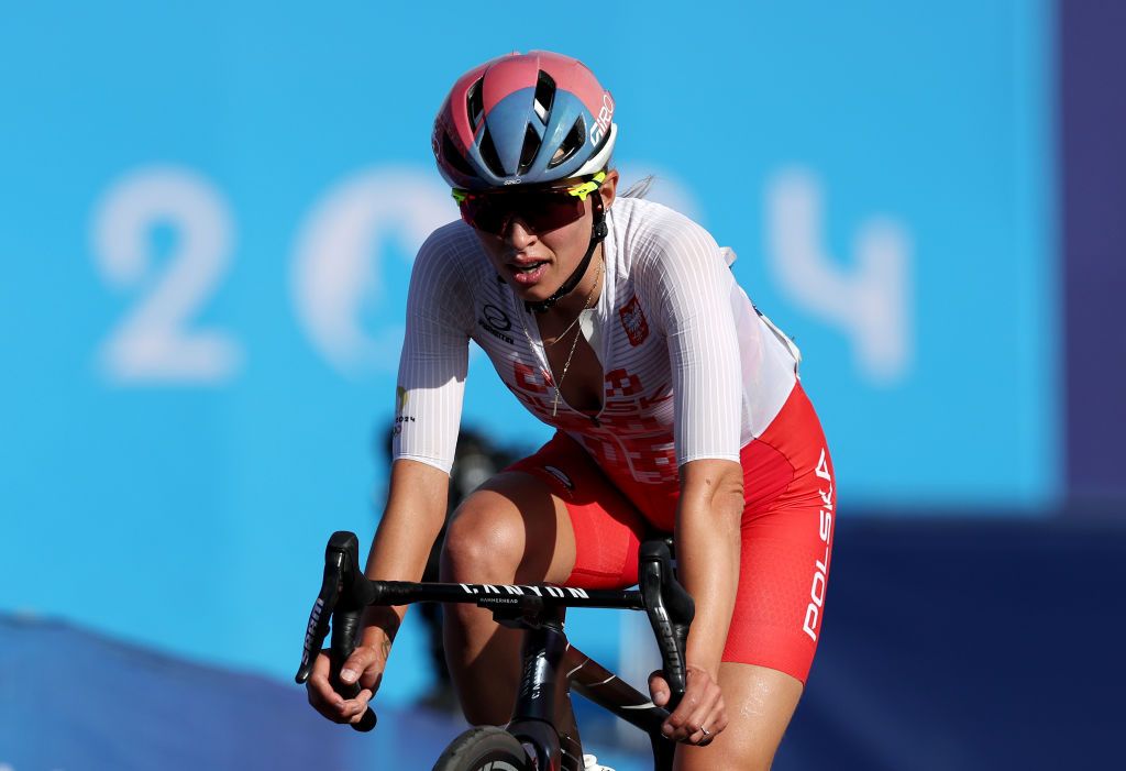 PARIS FRANCE AUGUST 04 Katarzyna Niewiadoma of Team Poland crosses the finish line during the Womens Road Race on day nine of the Olympic Games Paris 2024 at Trocadero on August 04 2024 in Paris France Photo by Tim de WaeleGetty Images