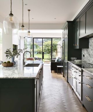modern kitchen with white countertop space and gold tap