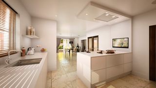 large white kitchen-diner garage conversion, with white island attached to wall, white cabinets and worktops, window to the left and bi-fold doors in the background
