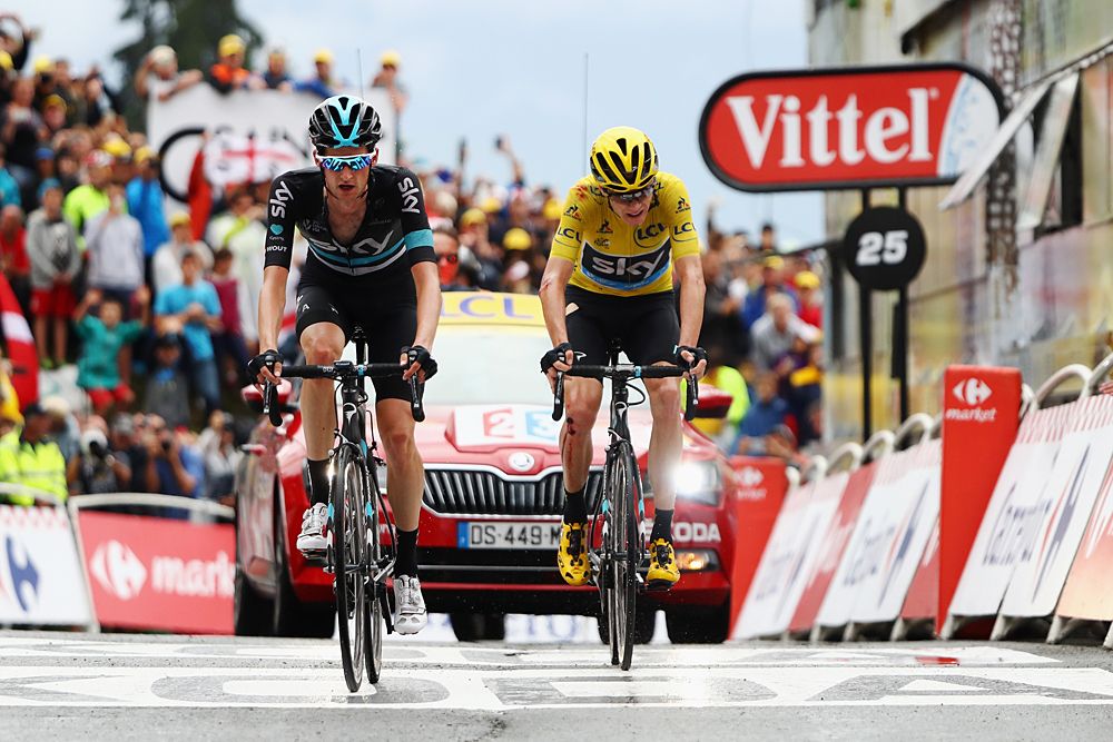 Chris Froome (Team Sky) makes it across the line with the yellow jersey