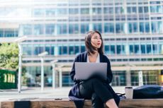 Woman researching investments