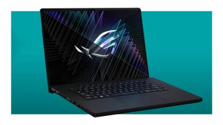 The Asus ROG Zephyrus M16 on a teal deals background