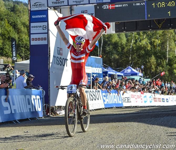 Simon Andreassen (Denmark) wins the junior men's race at cross country Worlds