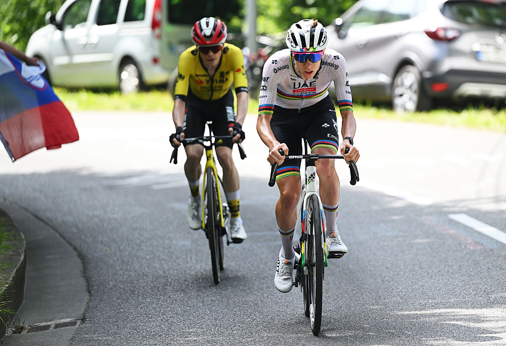 COMBLOUX, FRANCE - JUNE 13: (L-R) Jonas Vingegaard of Denmark and Team Visma | Lease a Bike and Tadej Pogacar of Slovenia and UAE Team Emirates - XRG compete during the 77th Criterium du Dauphine 2025, Stage 6 a 126.7km stage from Valserhone to Combloux 1183m / #UCIWT / on June 13, 2025 in Combloux, France. (Photo by Dario Belingheri/Getty Images)