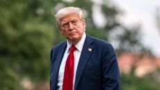 Donald Trump walks on the South Lawn of the White House