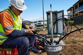 NBN worker upgrading infrastructure to FTTP