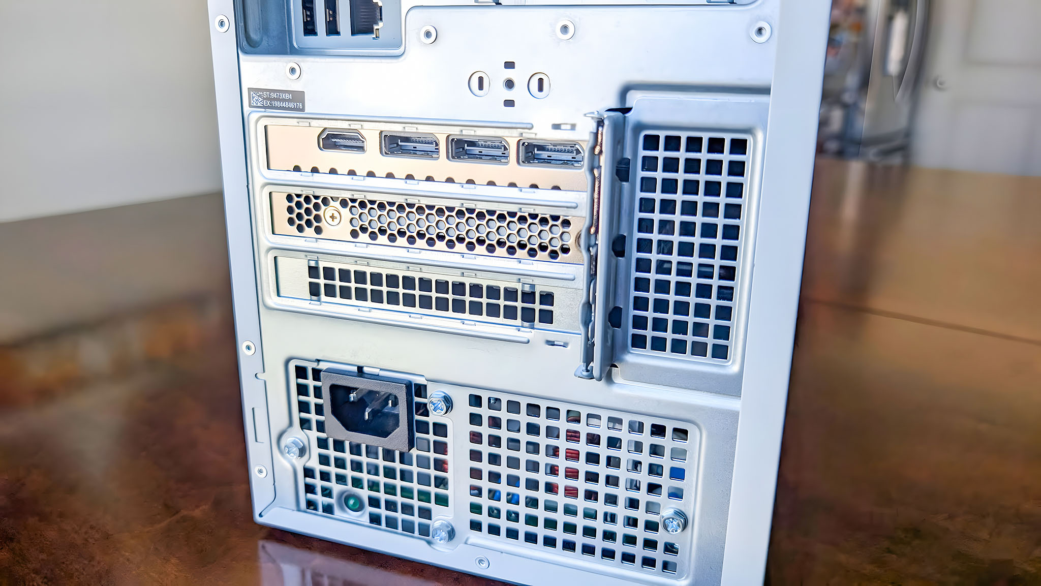 A closeup of the Dell Tower Plus EBT2250 GPU's HDMI port and three DisplayPort connections on the back.