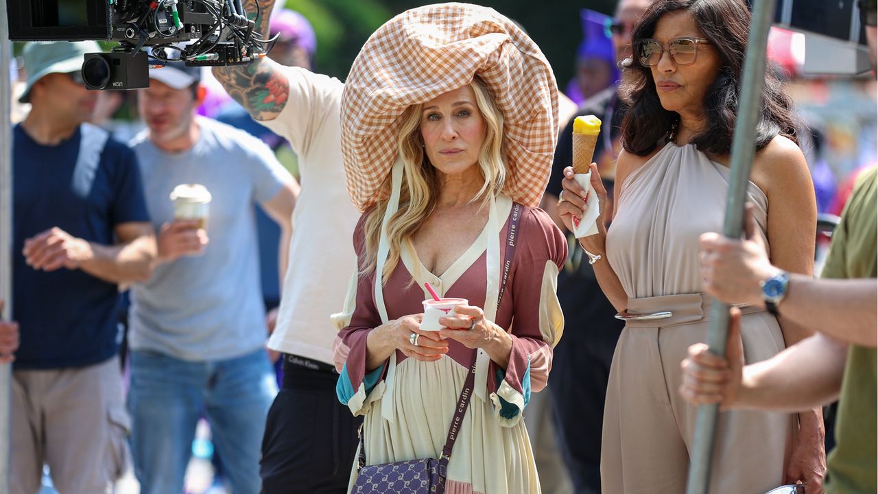 SJP Carrie Bradshaw wearing a vintage Ossie Clark dress and Maryam Keyhani hat