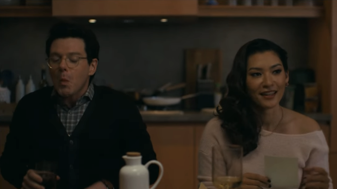 Stephens choking on spicy food next to Sasha in Watson Season 2x07