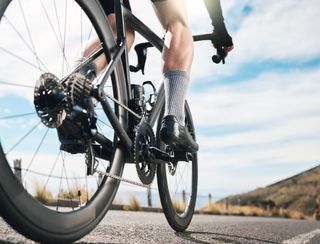 Cyclist legs and bike