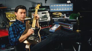 Former lead singer of "The Band," Robbie Robertson, poses in his recording studio during a 1987 Santa Monica, California photo session to promote his self-titled debut solo album.