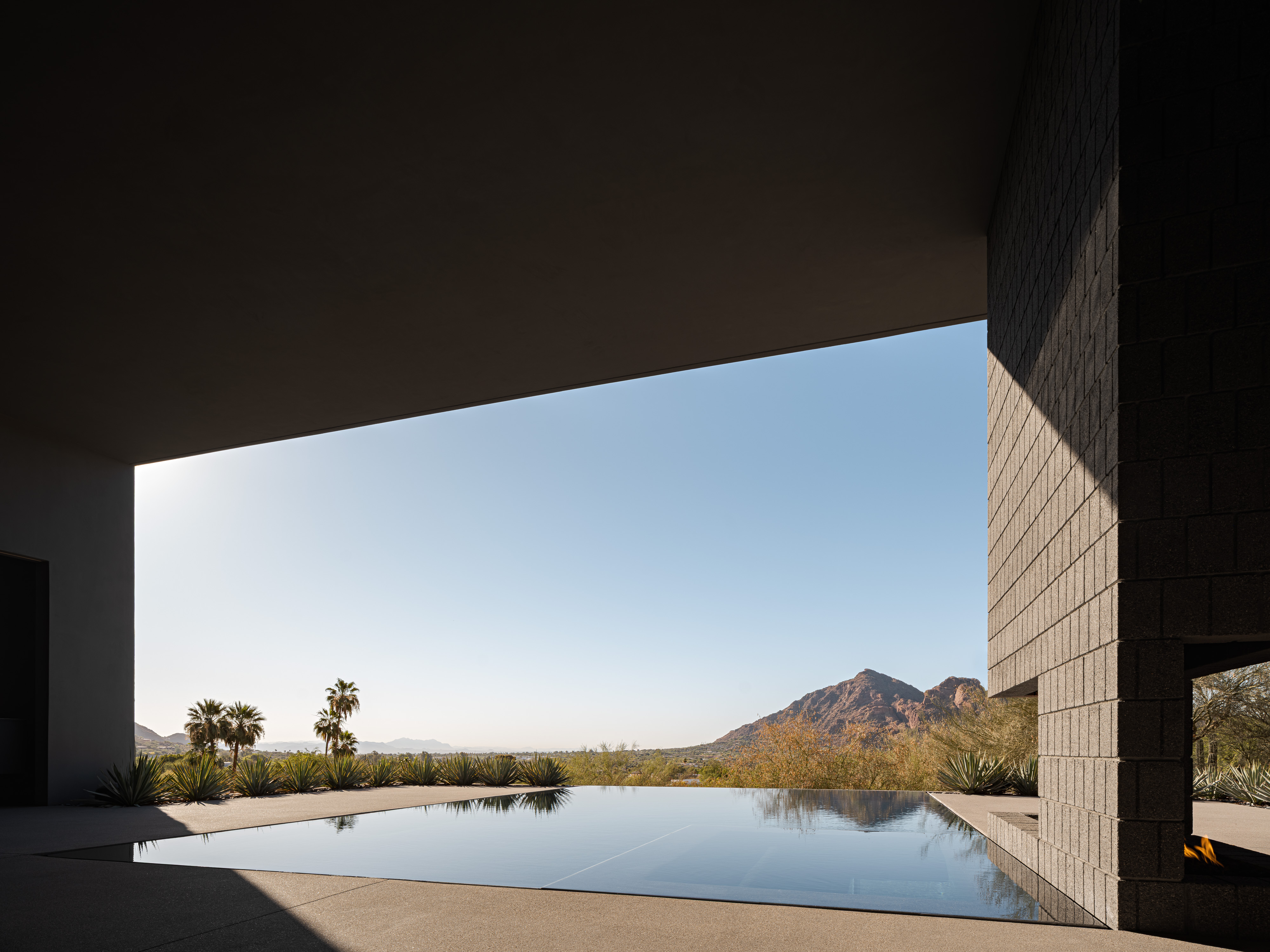 Arizona home Shifted Horizon by A-I-R, block built minimalist home, textured and monolithic looking in desert environment