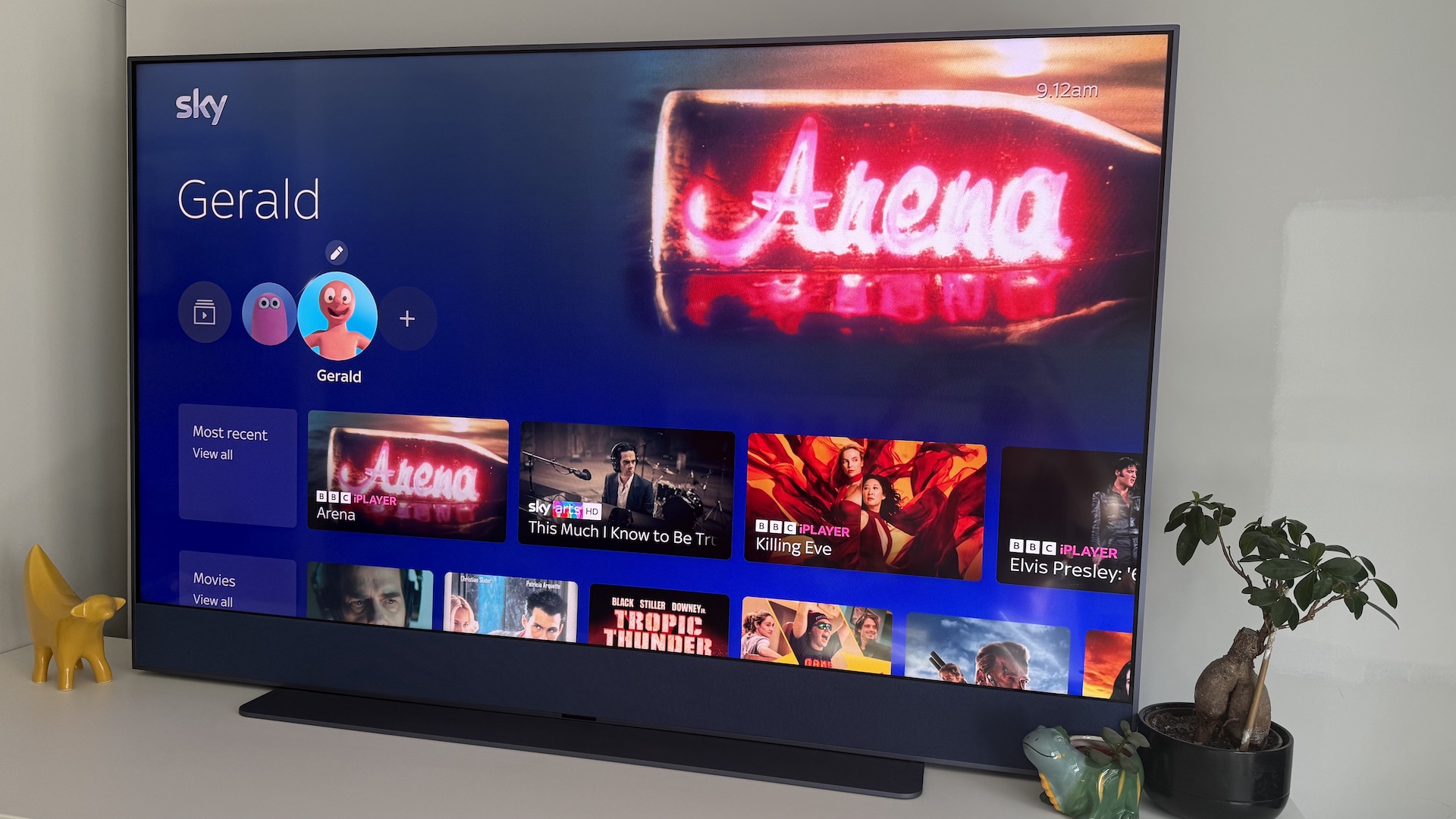 The Sky Glass Gen 2 screen on a white cabinet