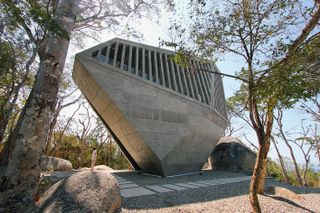 sunset chapel is designed in the shape of a boulder