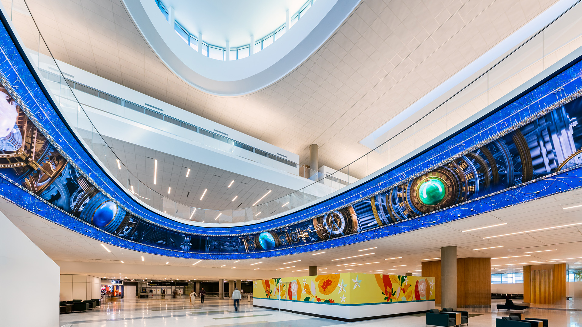 The Houston airport with a digital signage ring with colorful designs.