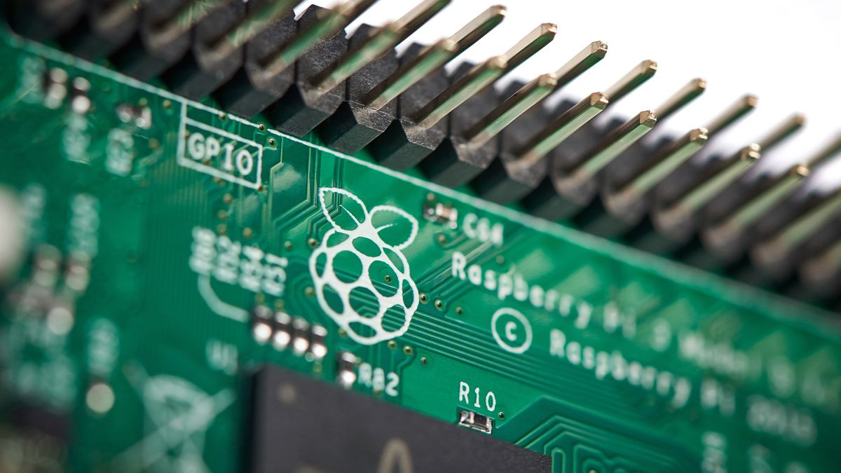 Close-up detail of the Raspberry Pi Foundation logo on a Raspberry Pi 3 Model B single-board computer.