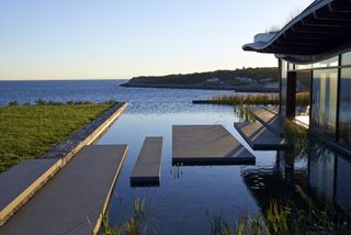 A natural swimming pool with views out to sea