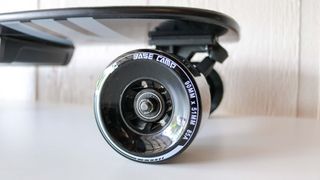 Close up of the Base Camp F11 electric skateboard's wheels