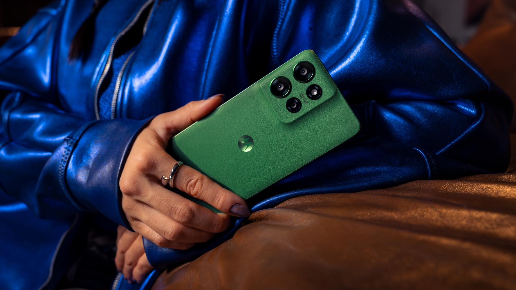 Someone holding a Leaf Green Moto G Power 2025