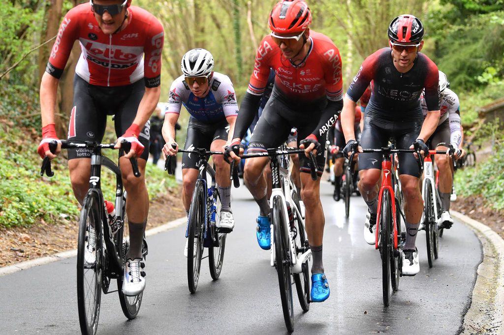 OVERIJSE BELGIUM APRIL 13 LR Remco Evenepoel of Belgium and Team QuickStep Alpha Vinyl and Magnus Sheffield of United States and Team INEOS Grenadiers compete in the breakaway during the 62nd De Brabantse Pijl La Flche Brabanonne 2022 Mens Elite a 2051km one day race from Leuven to Overijse BP22 on April 13 2022 in Overijse Belgium Photo by Luc ClaessenGetty Images