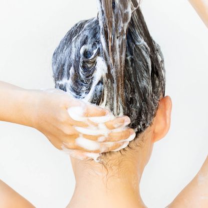 woman washing her hair