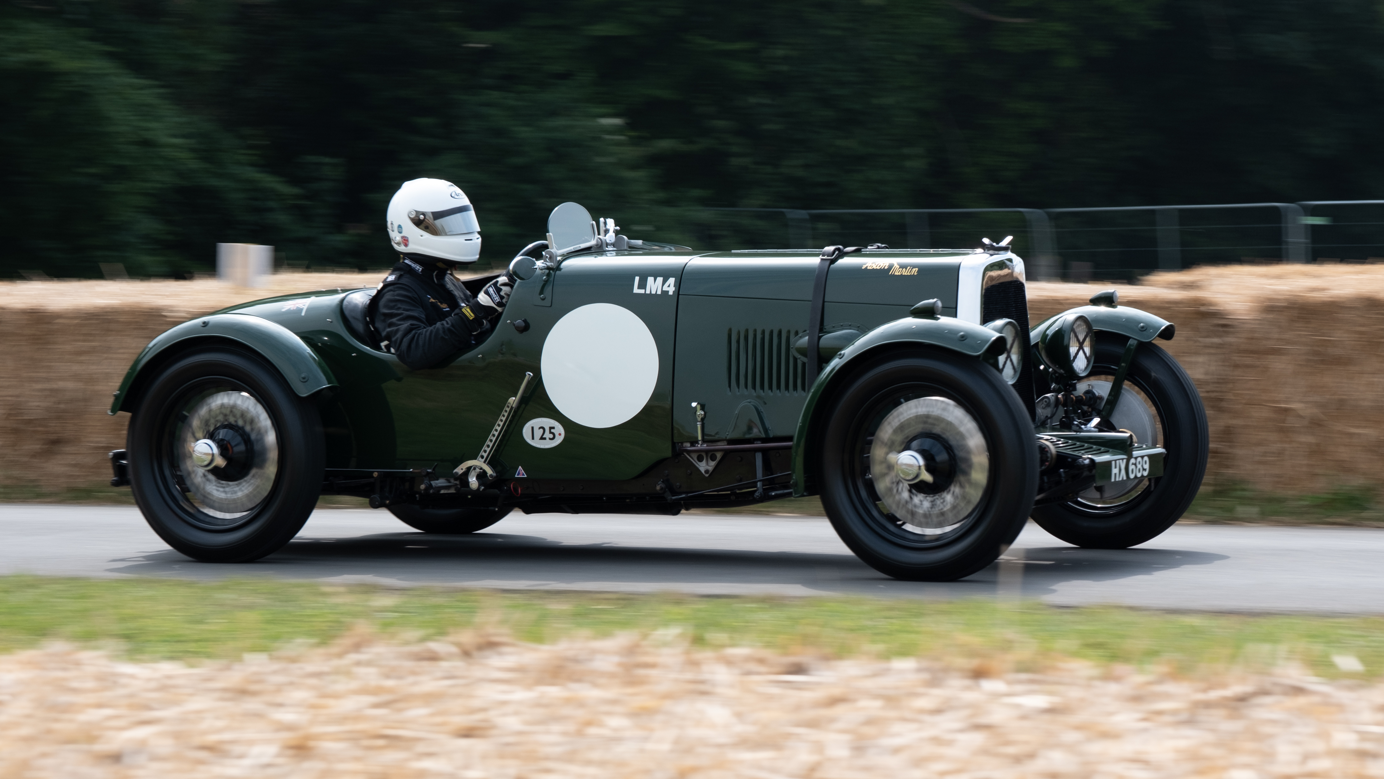 A car racing on as track at Goodwood