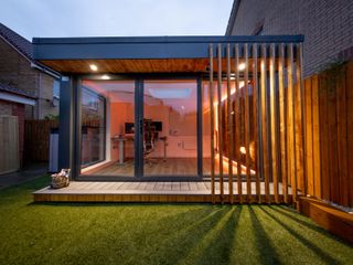 Modern garden room office at dusk with internal lighting from Urban Pods