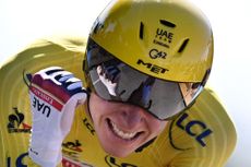 Tadej Pogacar during the 2021 Tour de France in a Le Coq Sportif yellow jersey