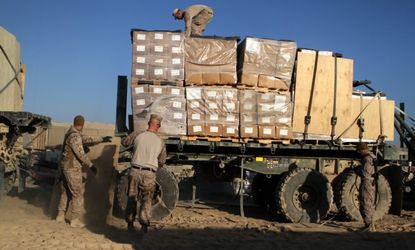 Patrol and combat supplies are unloaded on Oct. 24, 2012, in Afghanistan.
