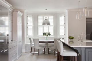a bay window idea with banquette seating