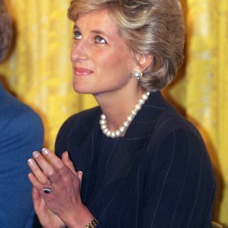 Princess Diana wears a French manicure with pearlescent nails