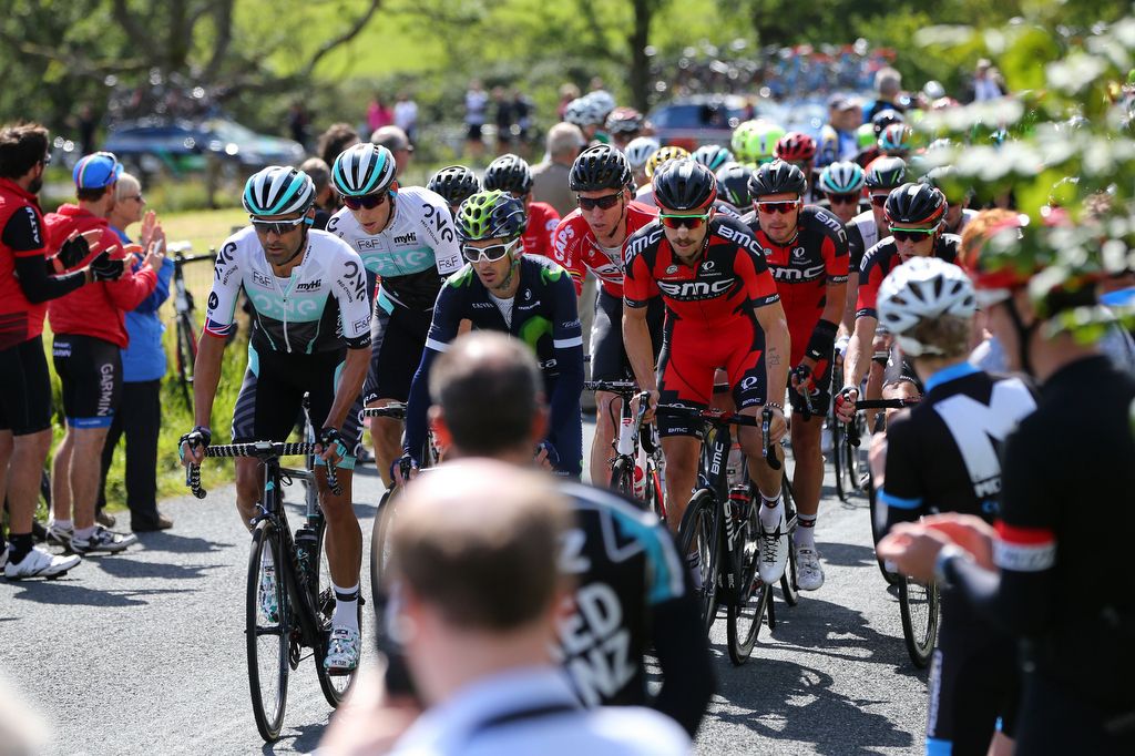 The peloton on the the climbs spread across the stage