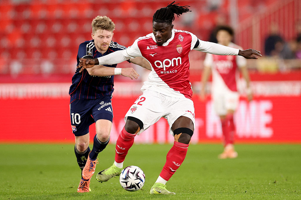 Lyon's Czech midfielder #10 Pavel Sulc (L) fights for the ball with Monaco's Ghanaian defender #22 Mohammed Salisu