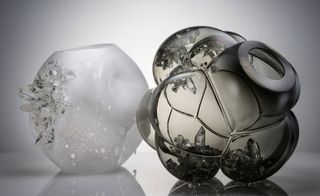 Crystal formations trapped inside high-gloss smoked glass bubbles