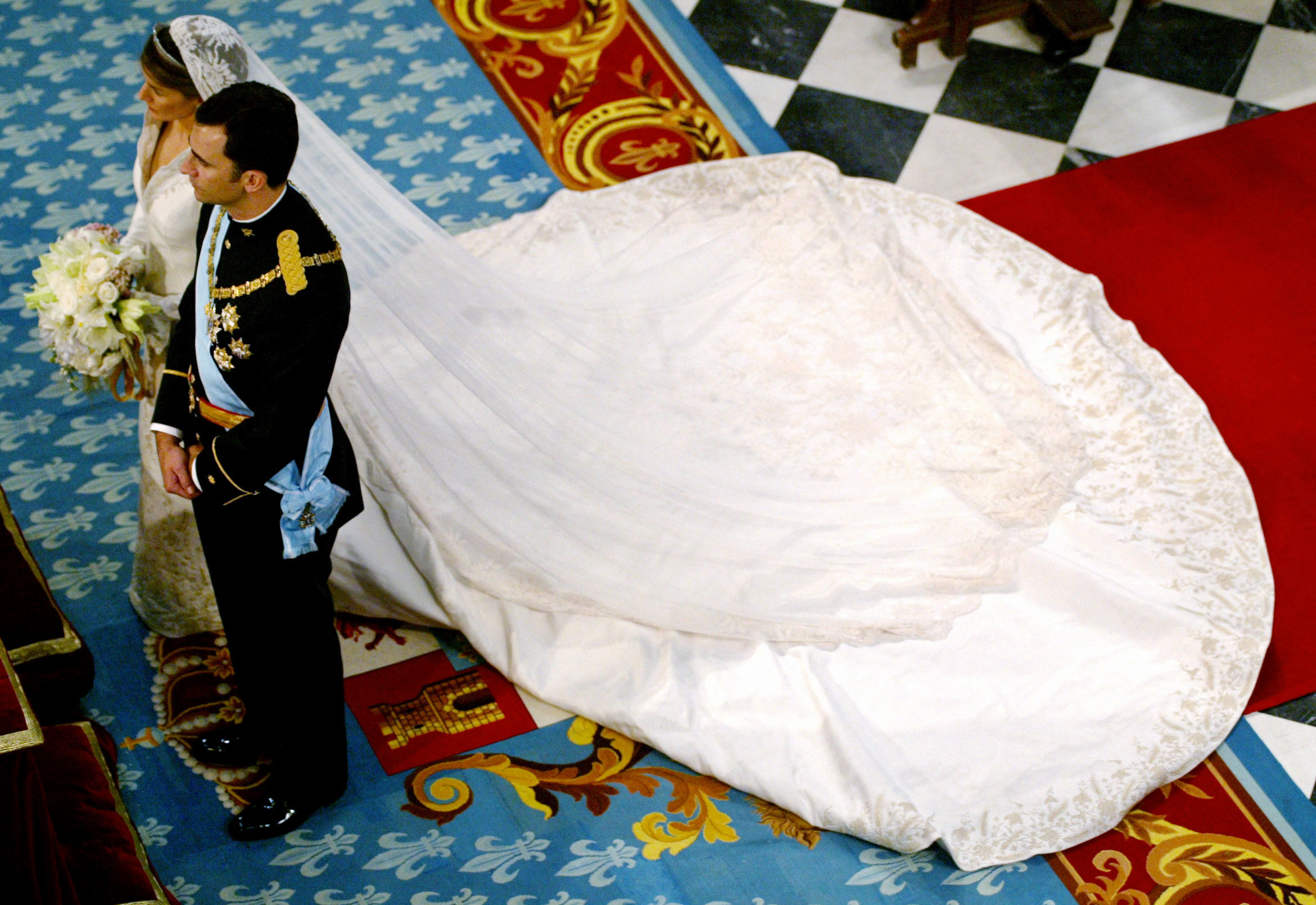 Queen Letizia on her wedding day at the altar with King Felipe