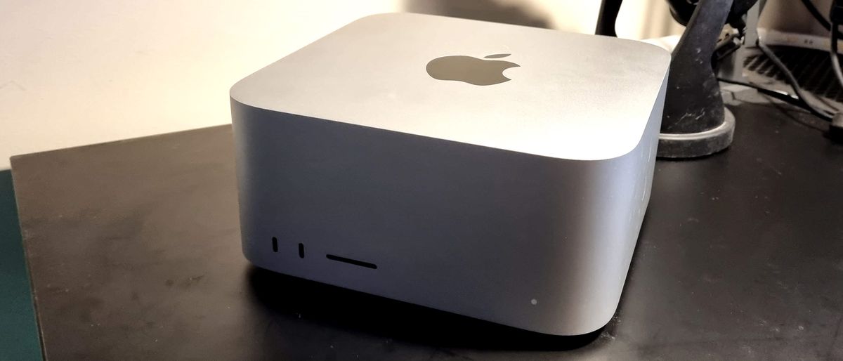 Mac Studio on a black desk