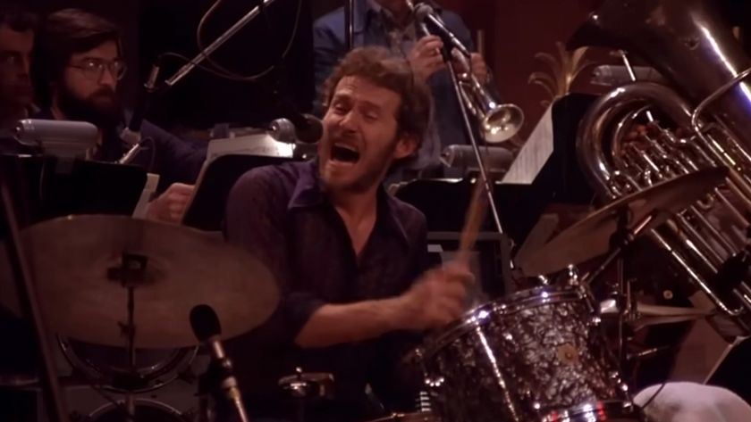 Levon Helm playing drums and singing in The Last Waltz