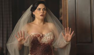 Jo Laughlin in bloody wedding dress returns Legacies Season 1