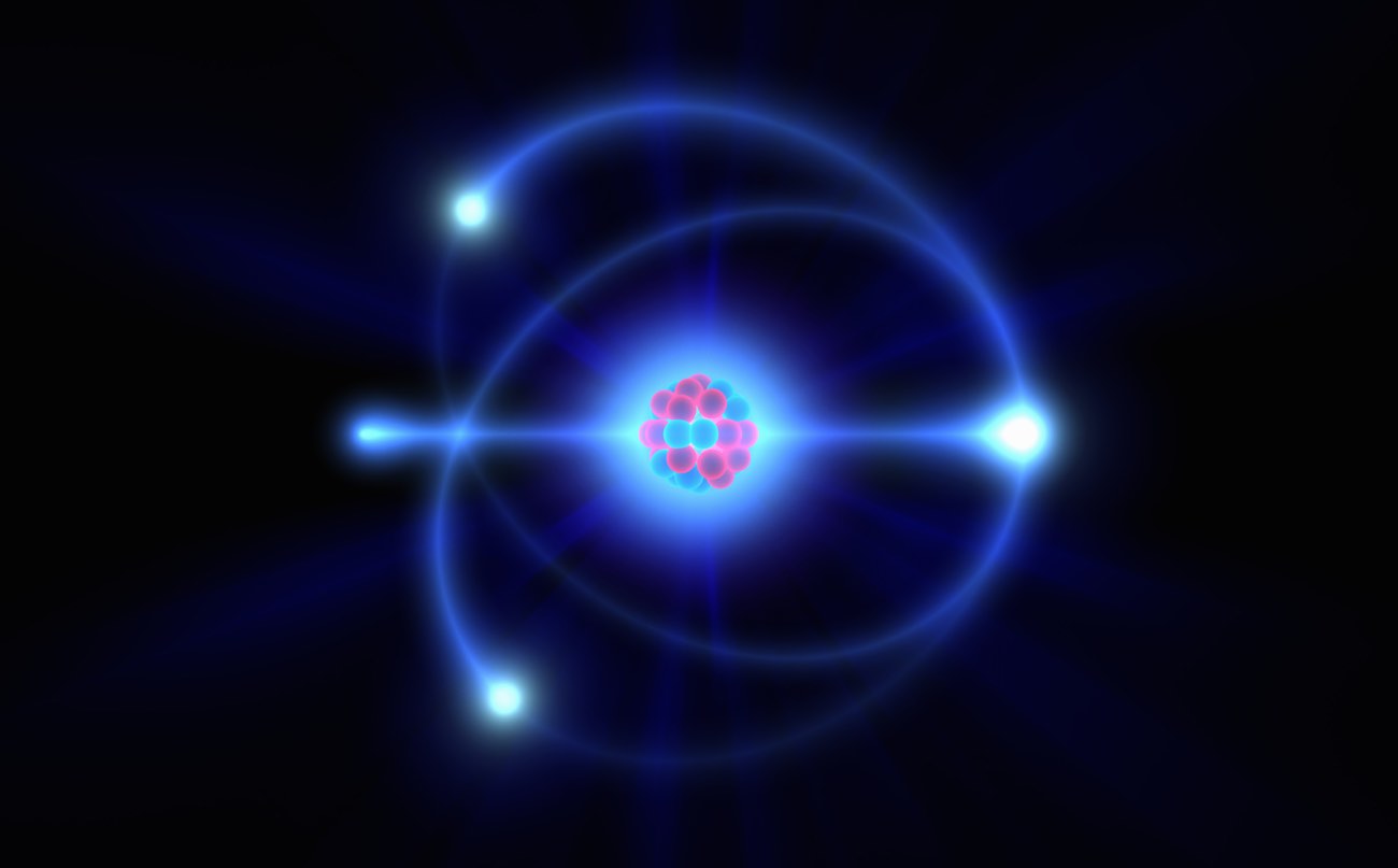 Atomic nucleus with orbiting electrons.