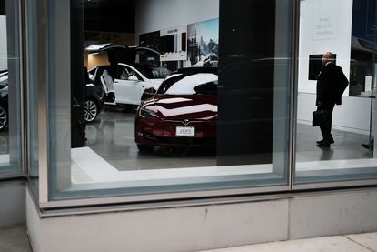 Tesla cars in a showroom