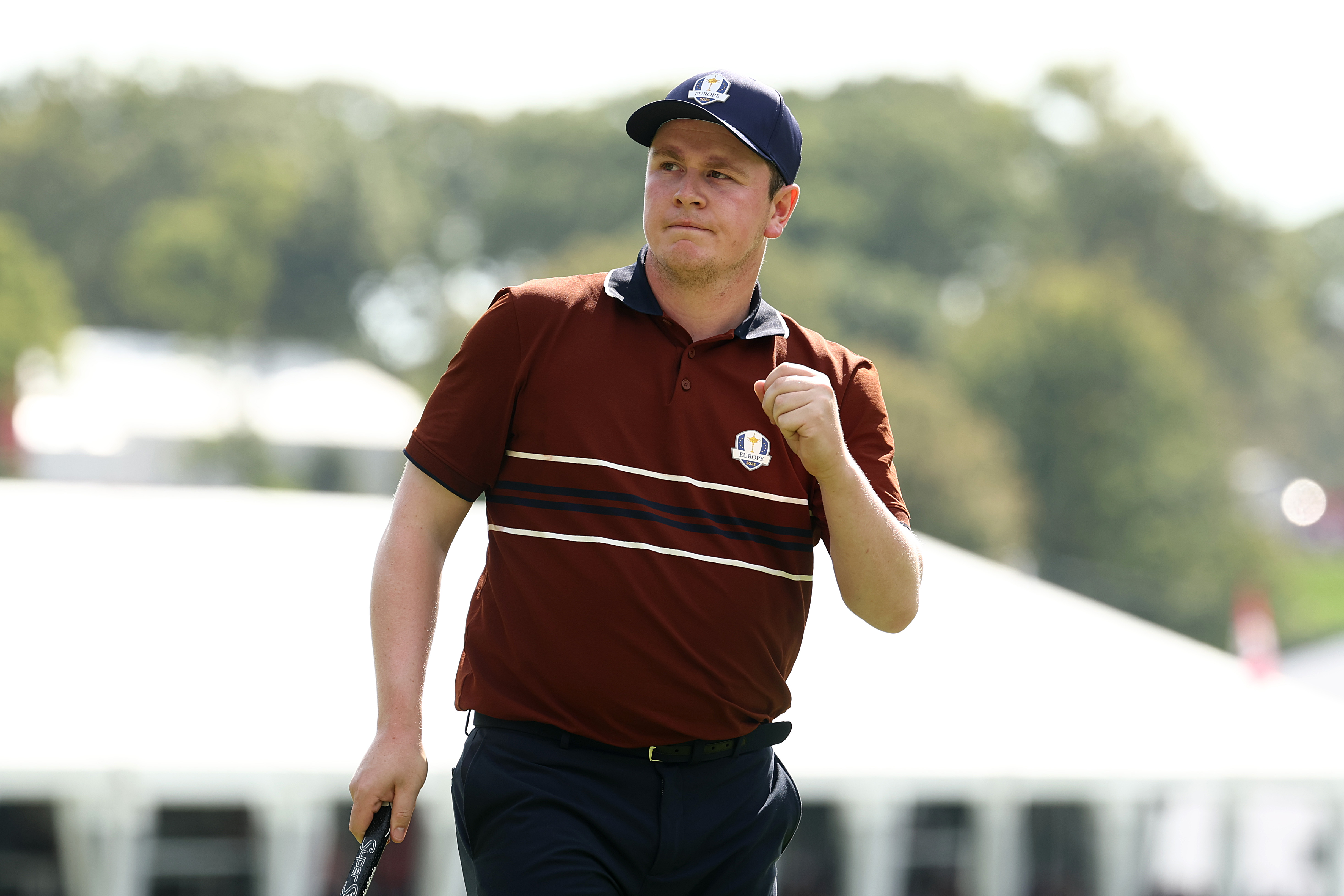 Robert MacIntyre celebrates holing a putt at the 2025 Ryder Cup