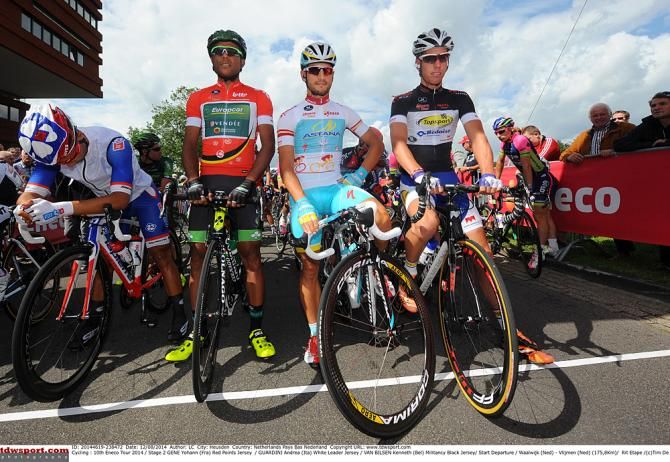 Eneco Tour jersey's at the start of stage 2: Yohann Gene (Fra) Team Europcar in points, Andrea Guardini (Ita) Astana in leader's jersey and Kenneth Van Bilsen (Bel) Topsport Vlaanderen in the most aggressive rider jersey
