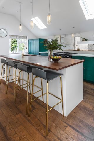 A ground floor extension gave Julie and James the chance to create their dream kitchen, with a vaulted ceiling and bold but sophisticated Shaker-style units