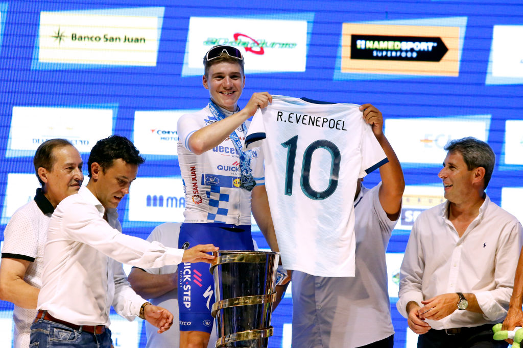 Deceuninck-QuickStep’s Remco Evenepoel is gifted an Argentina national football jersey on the podium