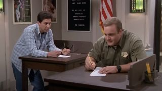 Ray Barone (Ray Romano) and Doug Heffernan (Kevin James) speak at The King of Queens