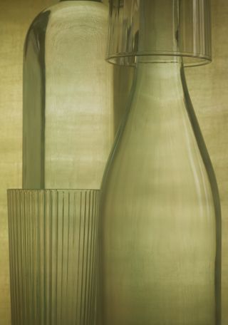 still life photo of a green glassware