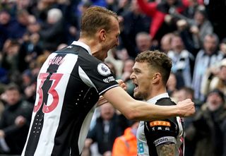 Newcastle’s Kieran Trippier (right) celebrates his winning goal against Aston Villa with team-mate Dan Burn