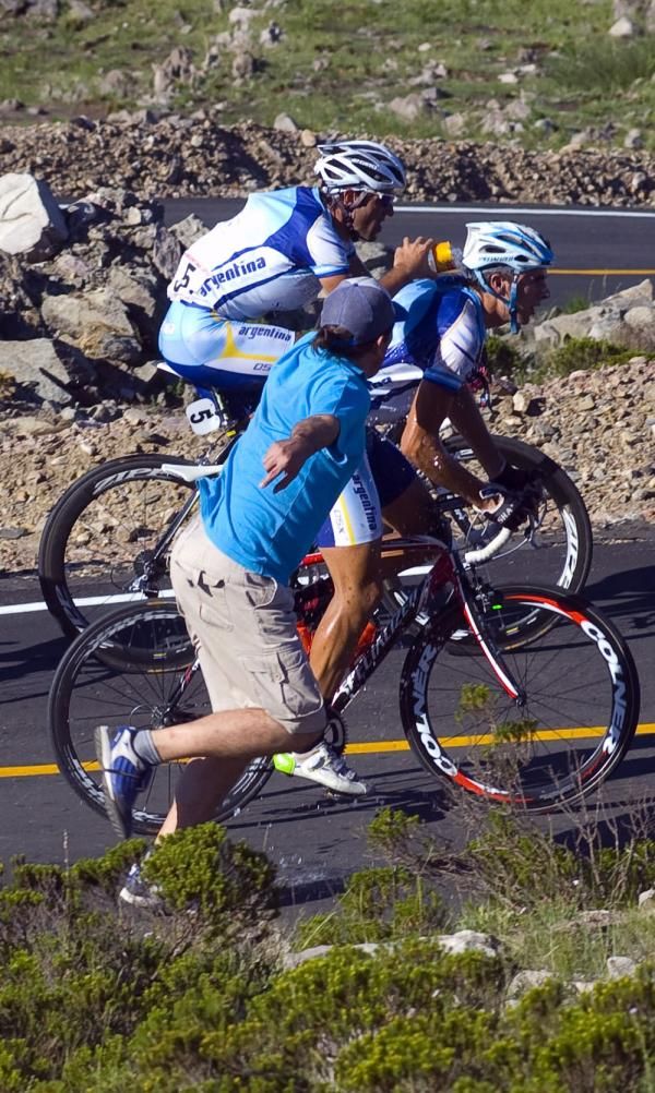 Argentina's national team riders get a quick shower en route