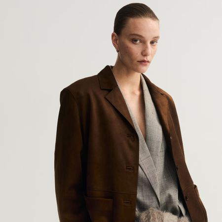 H&M model wearing a suede blazer 