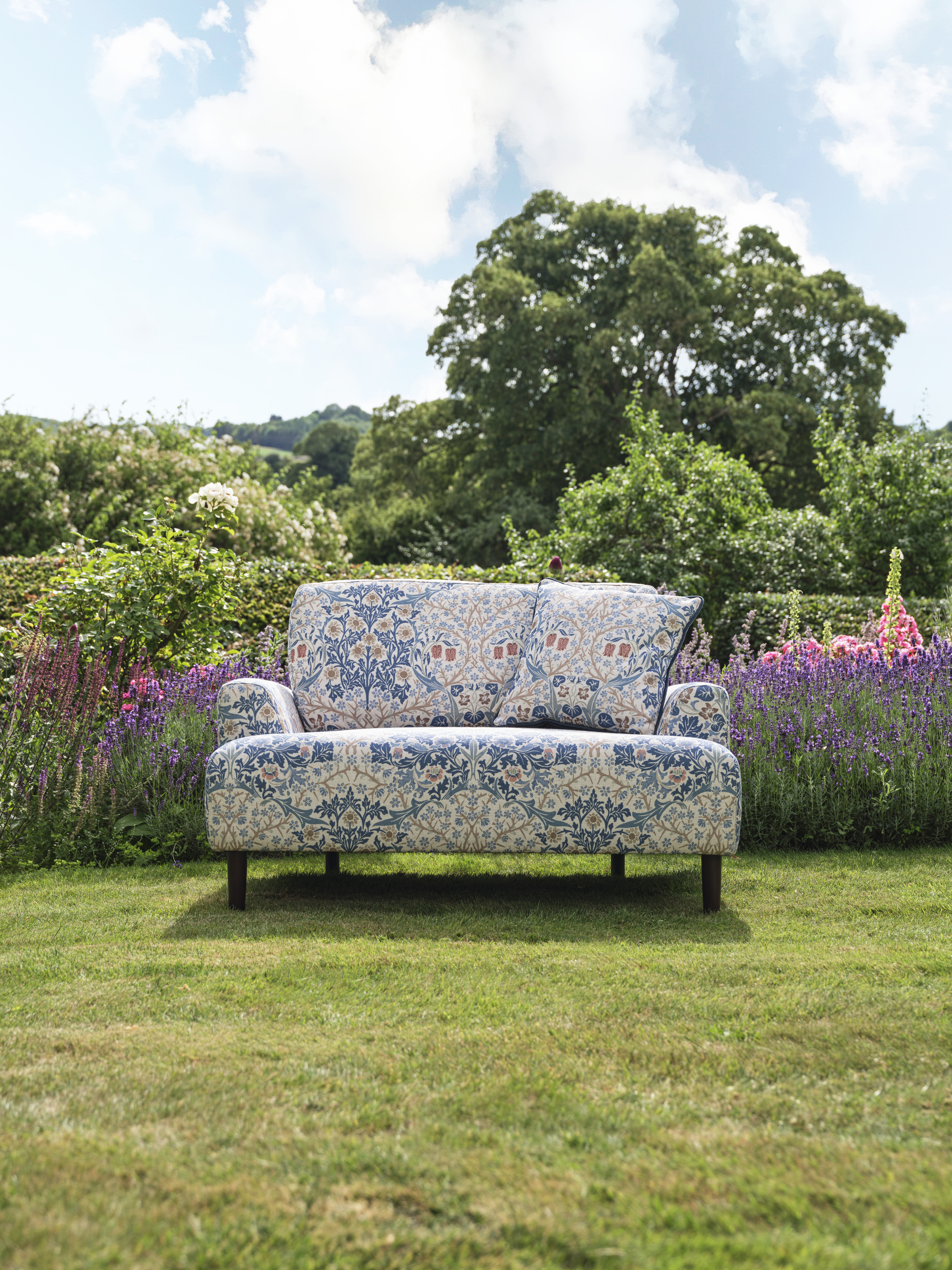 Swyft x Morris & Co. sofa in garden